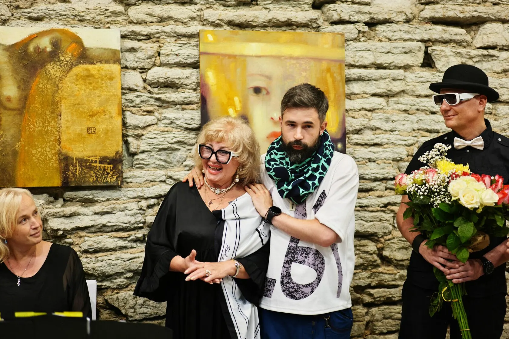 Artists and guests at a Sarle Gallery opening